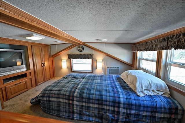 bedroom featuring carpet floors and a textured ceiling