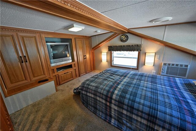 bedroom with a textured ceiling and carpet