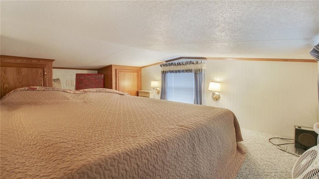 carpeted bedroom featuring lofted ceiling and a textured ceiling