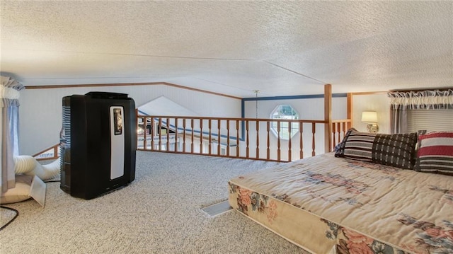 carpeted bedroom featuring crown molding and a textured ceiling