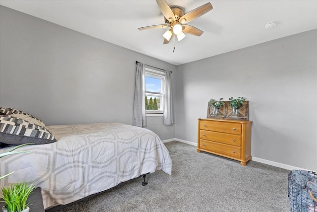 bedroom featuring baseboards, carpet, and ceiling fan