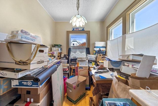2562 N 68th St Unit 2564, Wauwatosa, WI 53213 - office area with wood finished floors, crown molding, and a chandelier