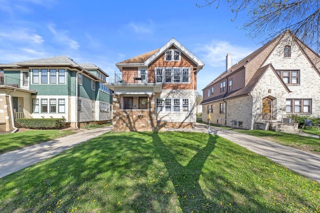 2562 N 68th St Unit 2564, Wauwatosa, WI 53213 - view of front of property featuring a front lawn and a balcony