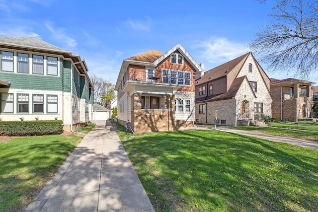2562 N 68th St Unit 2564, Wauwatosa, WI 53213 - view of front of house featuring an outdoor structure, a front yard, and a detached garage
