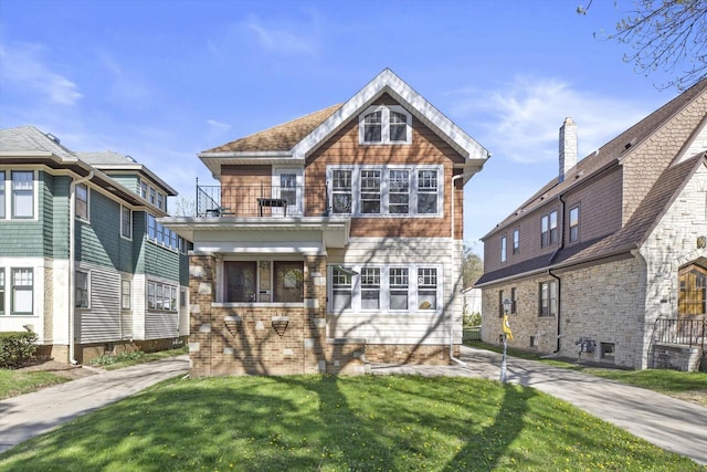 2562 N 68th St Unit 2564, Wauwatosa, WI 53213 - view of front facade with a balcony and a front yard