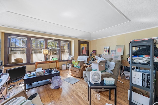 2562 N 68th St Unit 2564, Wauwatosa, WI 53213 - living room with a tray ceiling and wood finished floors