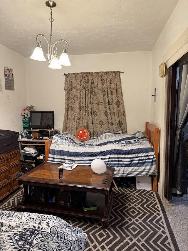 904 Elm St, Beloit, WI 53511 - bedroom featuring a chandelier