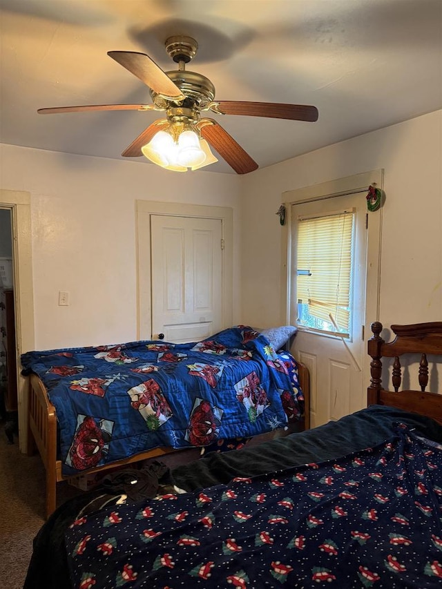 904 Elm St, Beloit, WI 53511 - carpeted bedroom with ceiling fan