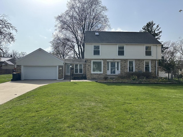 colonial house with brick siding, a garage, driveway, and a front yard