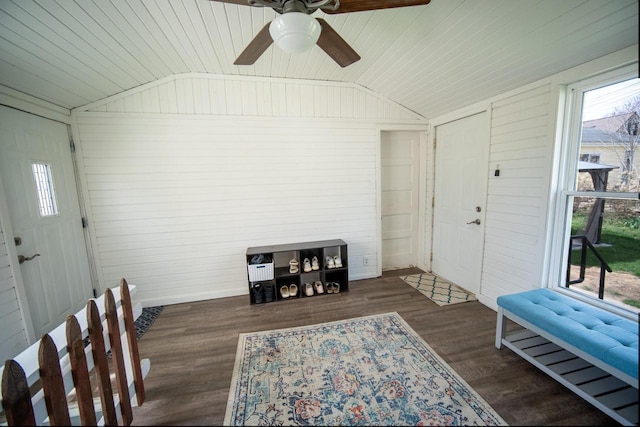 interior space featuring a ceiling fan, a healthy amount of sunlight, lofted ceiling, and wood ceiling