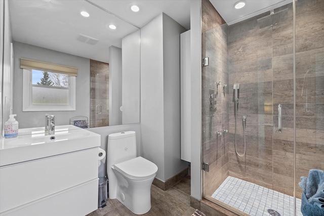 full bathroom with vanity, visible vents, toilet, recessed lighting, and a shower stall