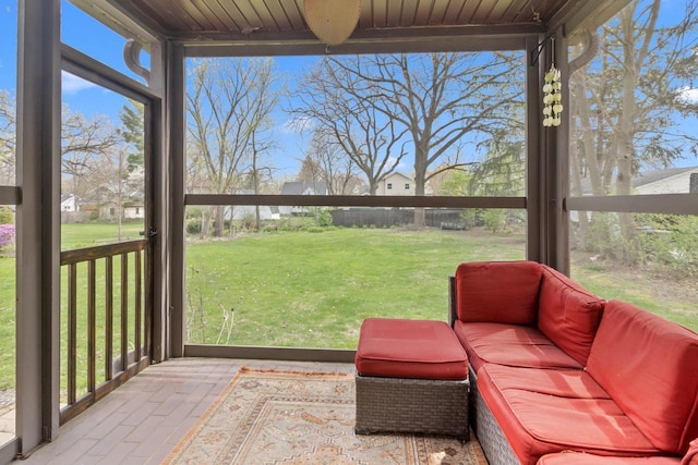 sunroom featuring a healthy amount of sunlight