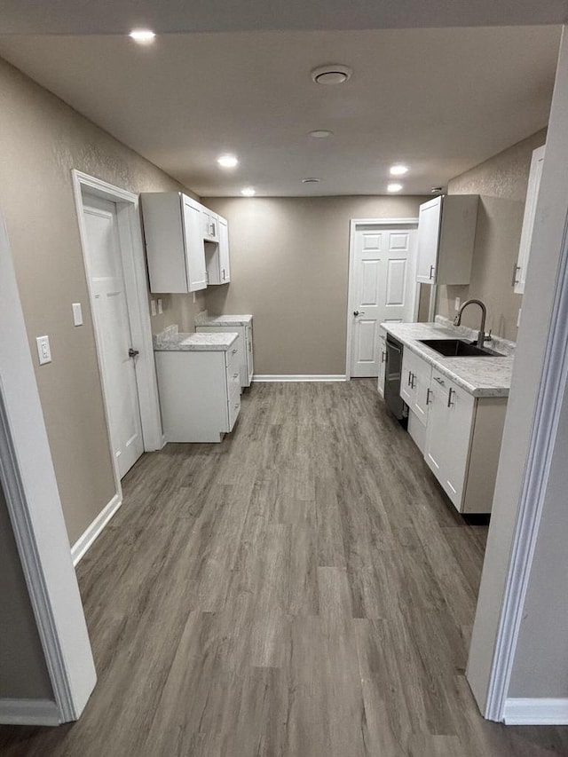1742 Kremer Ave, Racine, WI 53402 - kitchen featuring a sink, dark wood-type flooring, baseboards, white cabinets, and recessed lighting