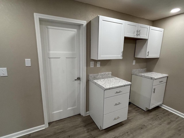 1742 Kremer Ave, Racine, WI 53402 - kitchen with dark wood-type flooring, baseboards, white cabinets, and recessed lighting