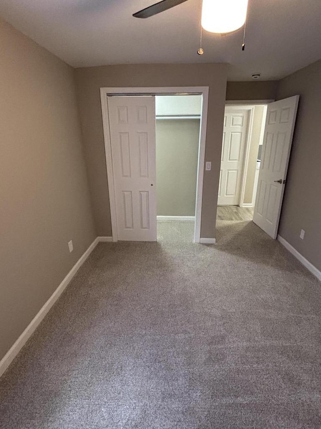 1742 Kremer Ave, Racine, WI 53402 - unfurnished bedroom featuring baseboards, carpet floors, ceiling fan, and a closet