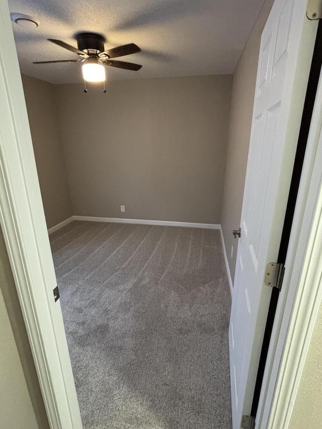 1742 Kremer Ave, Racine, WI 53402 - carpeted spare room featuring ceiling fan, a textured ceiling, and baseboards