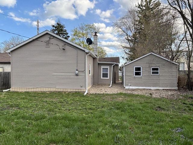 1742 Kremer Ave, Racine, WI 53402 - back of house featuring a chimney