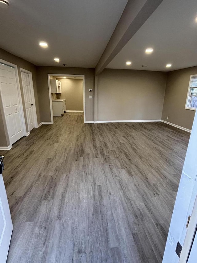 1742 Kremer Ave, Racine, WI 53402 - unfurnished living room featuring baseboards, wood finished floors, and recessed lighting