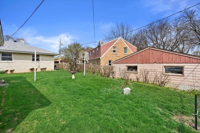view of yard featuring fence