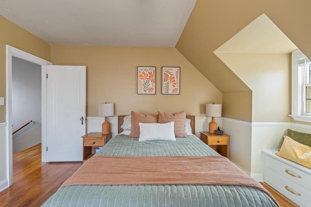 bedroom featuring wood finished floors
