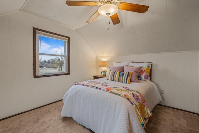 carpeted bedroom featuring a ceiling fan and lofted ceiling