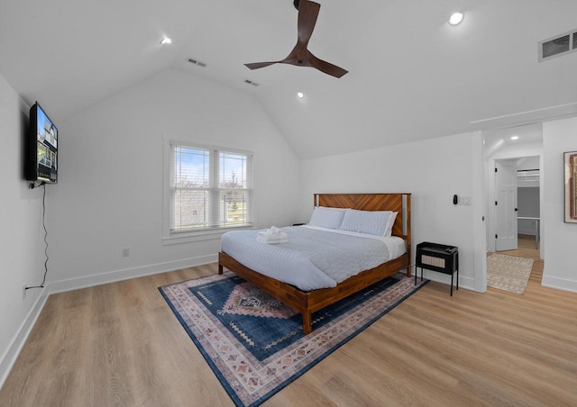 397 W Geneva St, Williams Bay, WI 53191 - bedroom with visible vents, baseboards, light wood-style flooring, and lofted ceiling