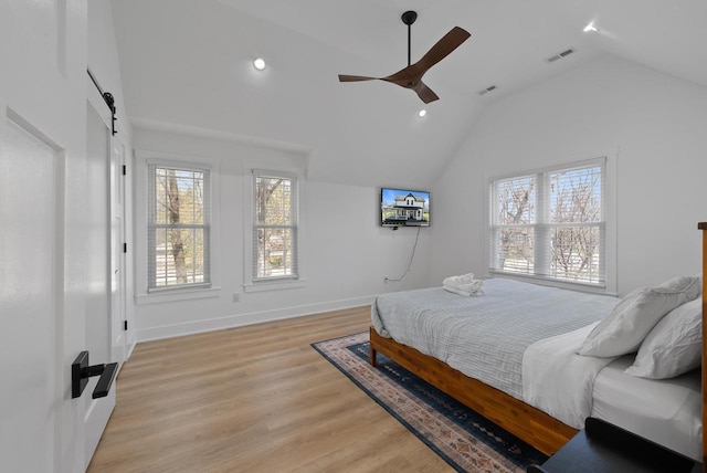 397 W Geneva St, Williams Bay, WI 53191 - bedroom with recessed lighting, lofted ceiling, light wood-type flooring, and visible vents