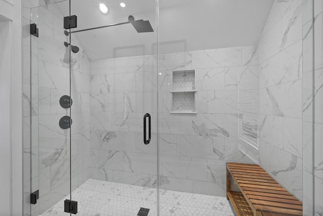397 W Geneva St, Williams Bay, WI 53191 - bathroom featuring vaulted ceiling and a shower stall