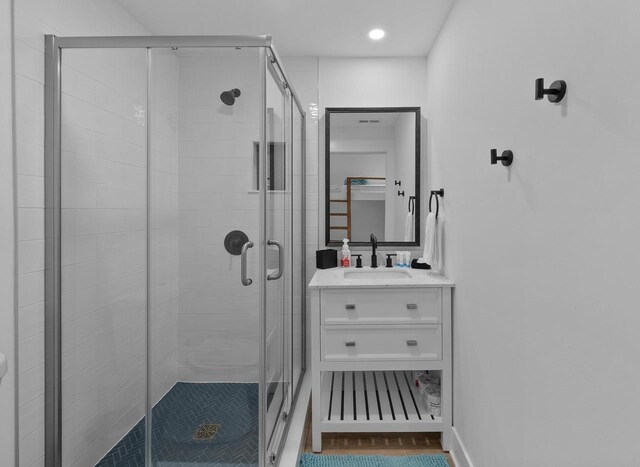 397 W Geneva St, Williams Bay, WI 53191 - full bathroom featuring vanity, recessed lighting, and a stall shower