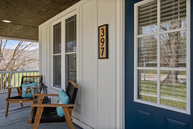397 W Geneva St, Williams Bay, WI 53191 - view of exterior entry with a porch