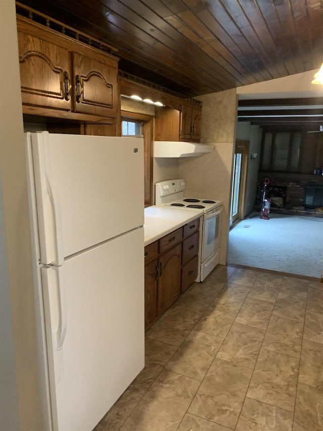 312 W Buehler Ave, Nekoosa, WI 54457 - kitchen featuring white appliances, under cabinet range hood, wood ceiling, and light countertops