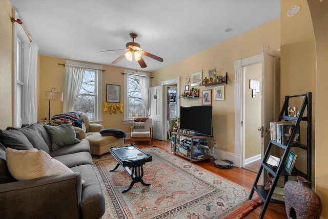 1932 N Warren Ave Unit 1934, Milwaukee, WI 53202 - living room with baseboards, ceiling fan, and wood finished floors