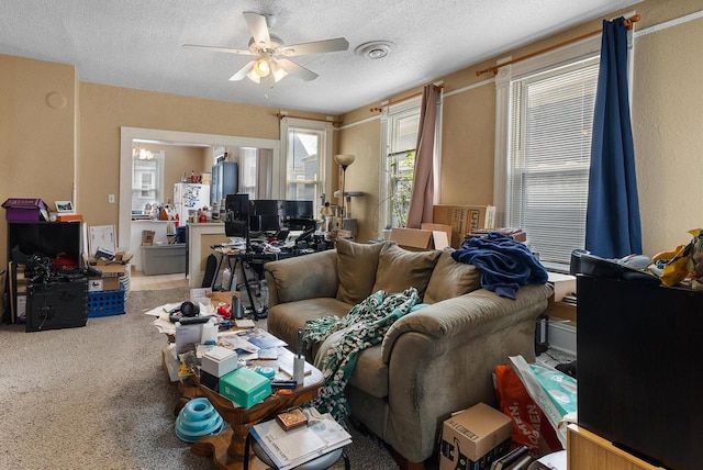 1932 N Warren Ave Unit 1934, Milwaukee, WI 53202 - living room with carpet floors, ceiling fan, and a textured ceiling