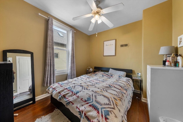 1932 N Warren Ave Unit 1934, Milwaukee, WI 53202 - bedroom with visible vents, a ceiling fan, baseboards, and dark wood-style floors