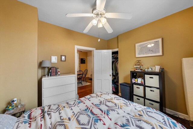 1932 N Warren Ave Unit 1934, Milwaukee, WI 53202 - bedroom featuring a closet, a ceiling fan, and wood finished floors