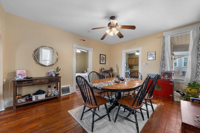 1932 N Warren Ave Unit 1934, Milwaukee, WI 53202 - dining area featuring visible vents, ceiling fan, and hardwood / wood-style flooring