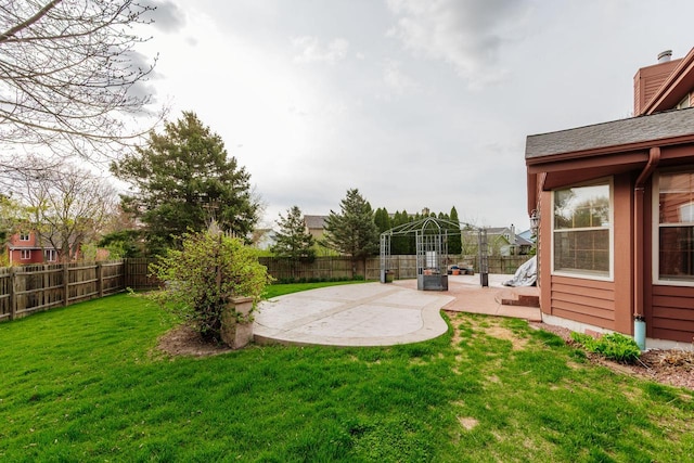 view of yard with a fenced backyard, a patio, and a gazebo