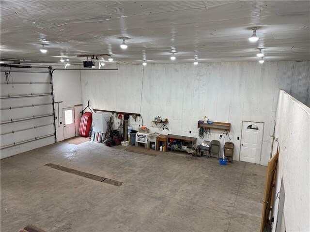 8523 Lakeside Rd, Trego, WI 54888 - garage featuring a garage door opener