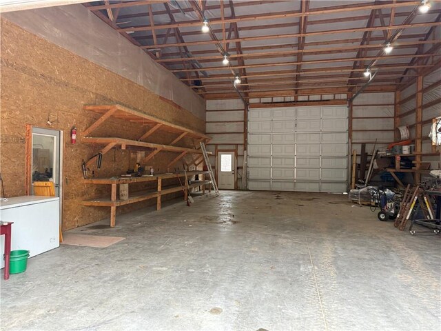 8523 Lakeside Rd, Trego, WI 54888 - garage with refrigerator