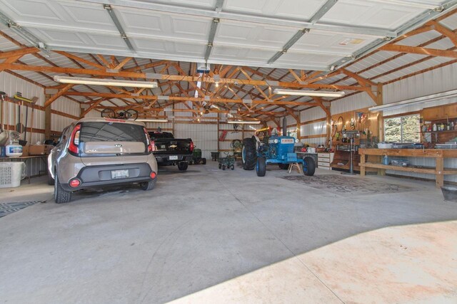 E2145 Johanson Rd, Iola, WI 54945 - garage featuring a workshop area and metal wall