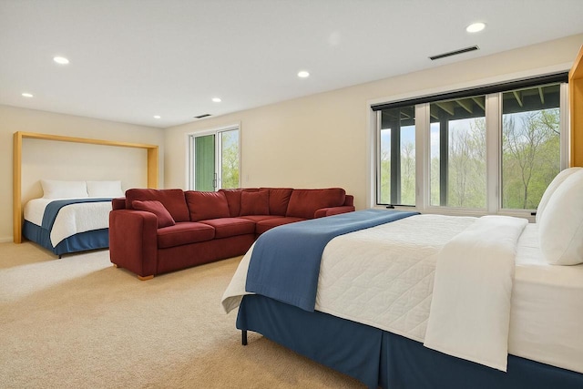 bedroom featuring visible vents, recessed lighting, and carpet