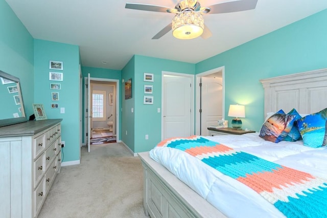 bedroom with baseboards, light colored carpet, and ceiling fan