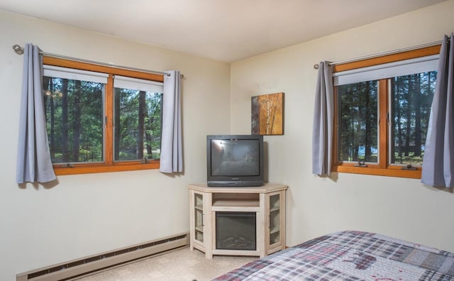 bedroom with a baseboard radiator