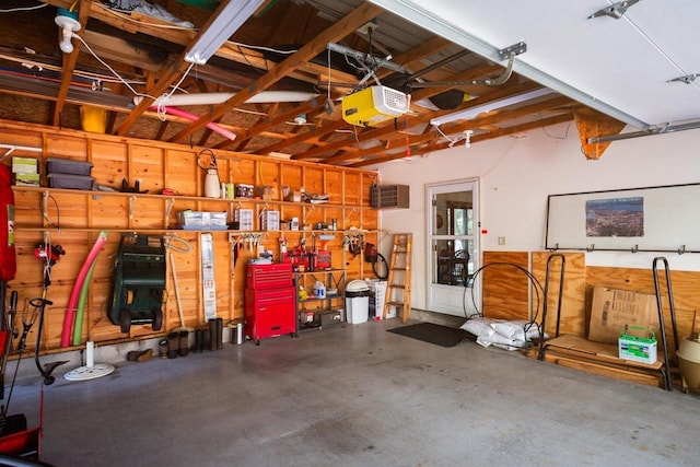 garage featuring a garage door opener
