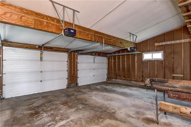 garage featuring a garage door opener