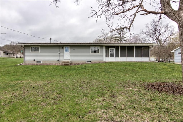 rear view of property featuring a yard, a sunroom, entry steps, and central air condition unit