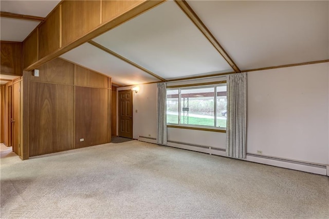 unfurnished living room with vaulted ceiling, light carpet, and a baseboard radiator