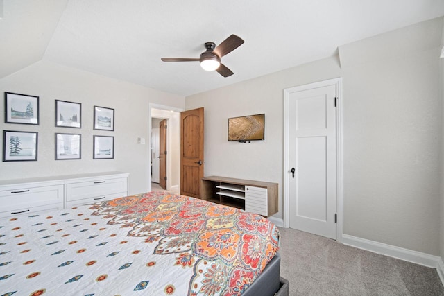 bedroom featuring a ceiling fan, baseboards, and light carpet