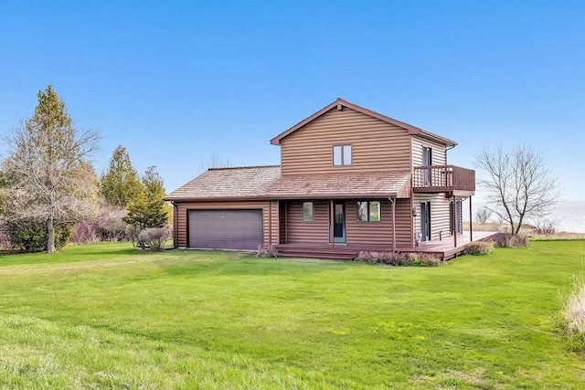 E4905 Lakeshore Rd, Kewaunee, WI 54216 - exterior space featuring a garage, a yard, driveway, and covered porch