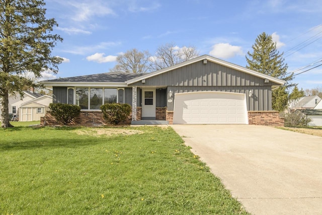 ranch-style home with brick siding, an attached garage, a front yard, and concrete driveway